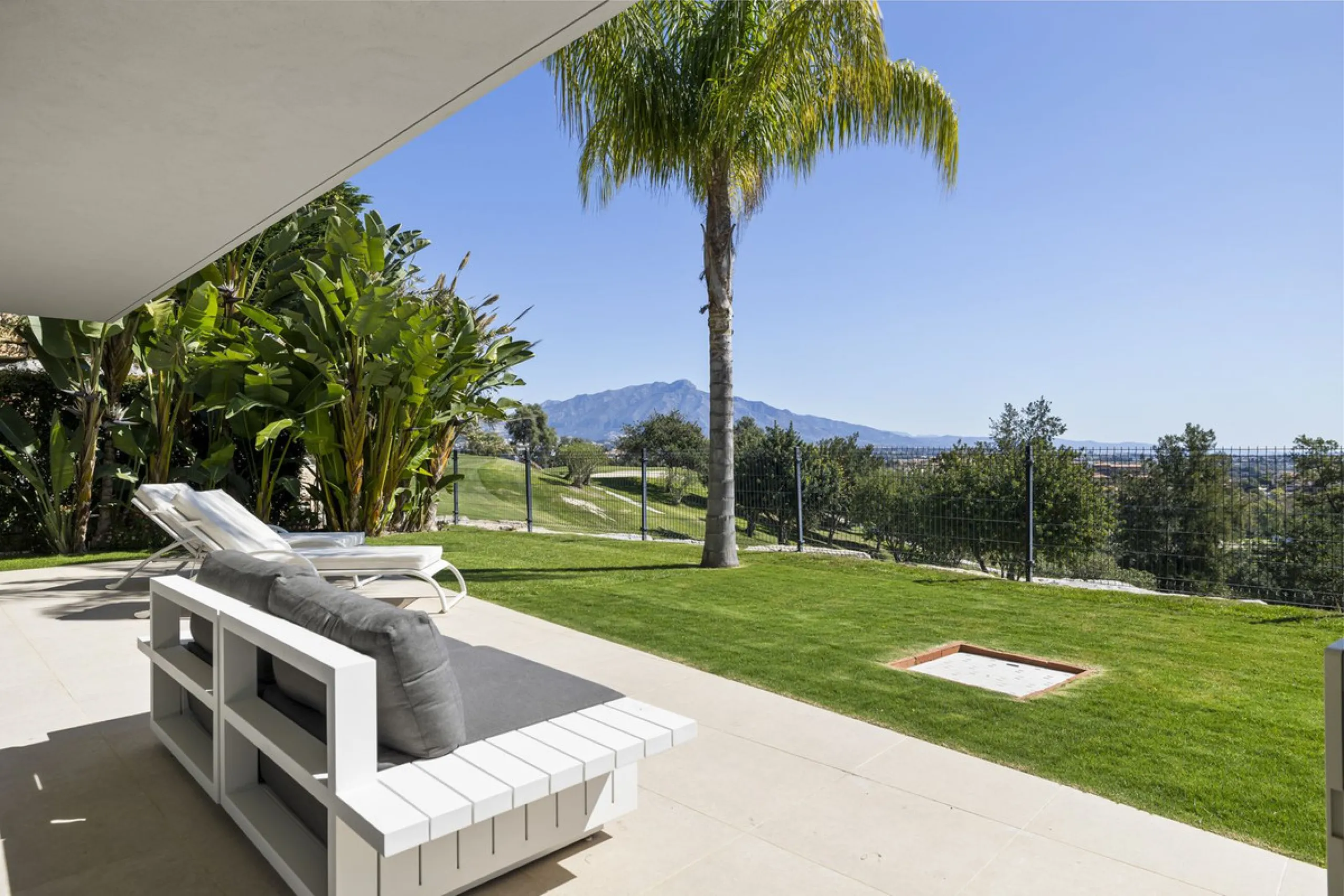 Newly built contemporary villa situated in the prestigious urbanization of La Alquería, Benahavís. Positioned frontline golf and facing east to south, the property offers panoramic views of the Mediterranean Sea, the coastline, and the iconic La Concha mo