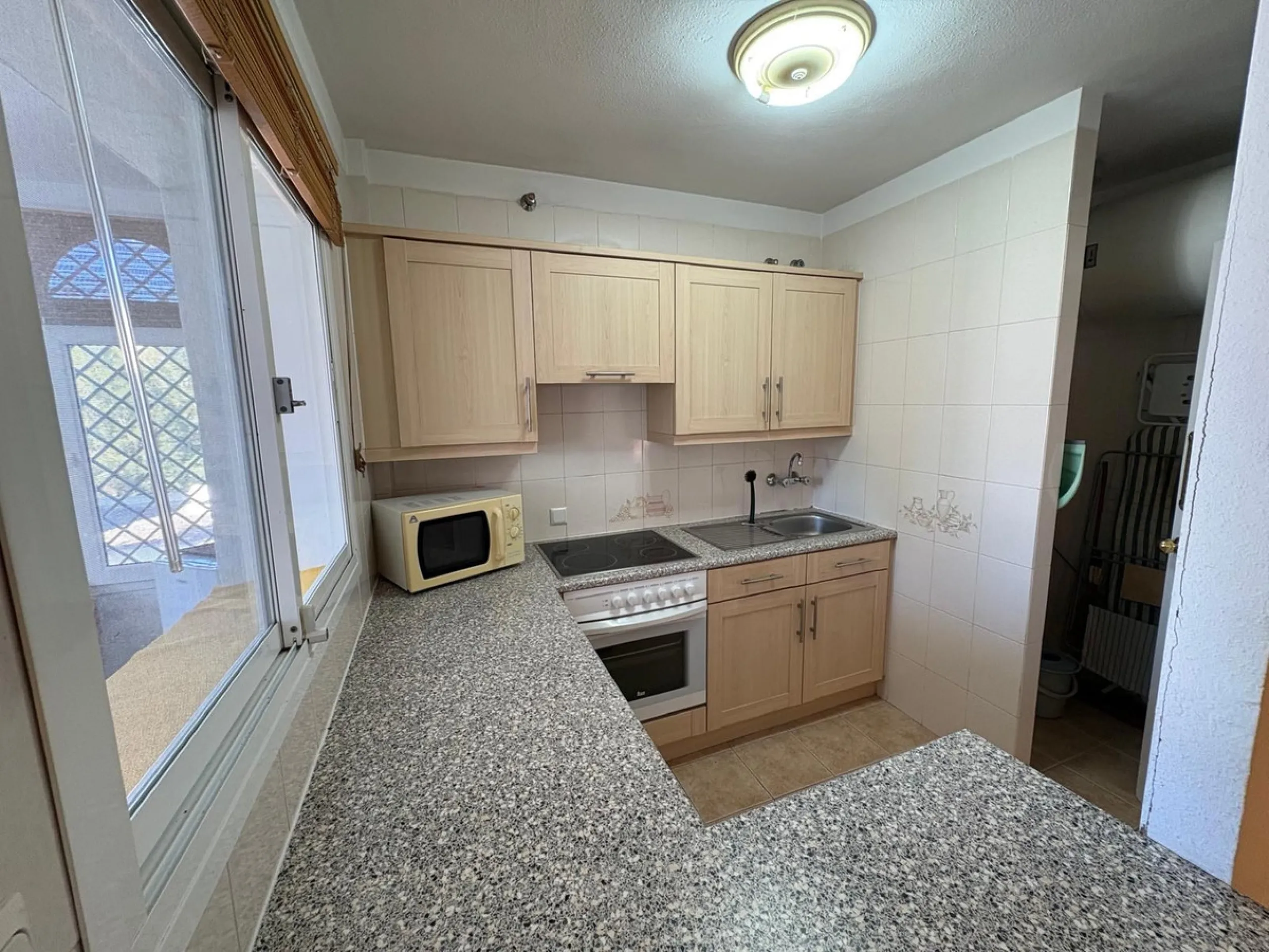Beautiful south-facing 2-bedroom, 1-bathroom apartment located in La Reserva de Marbella.