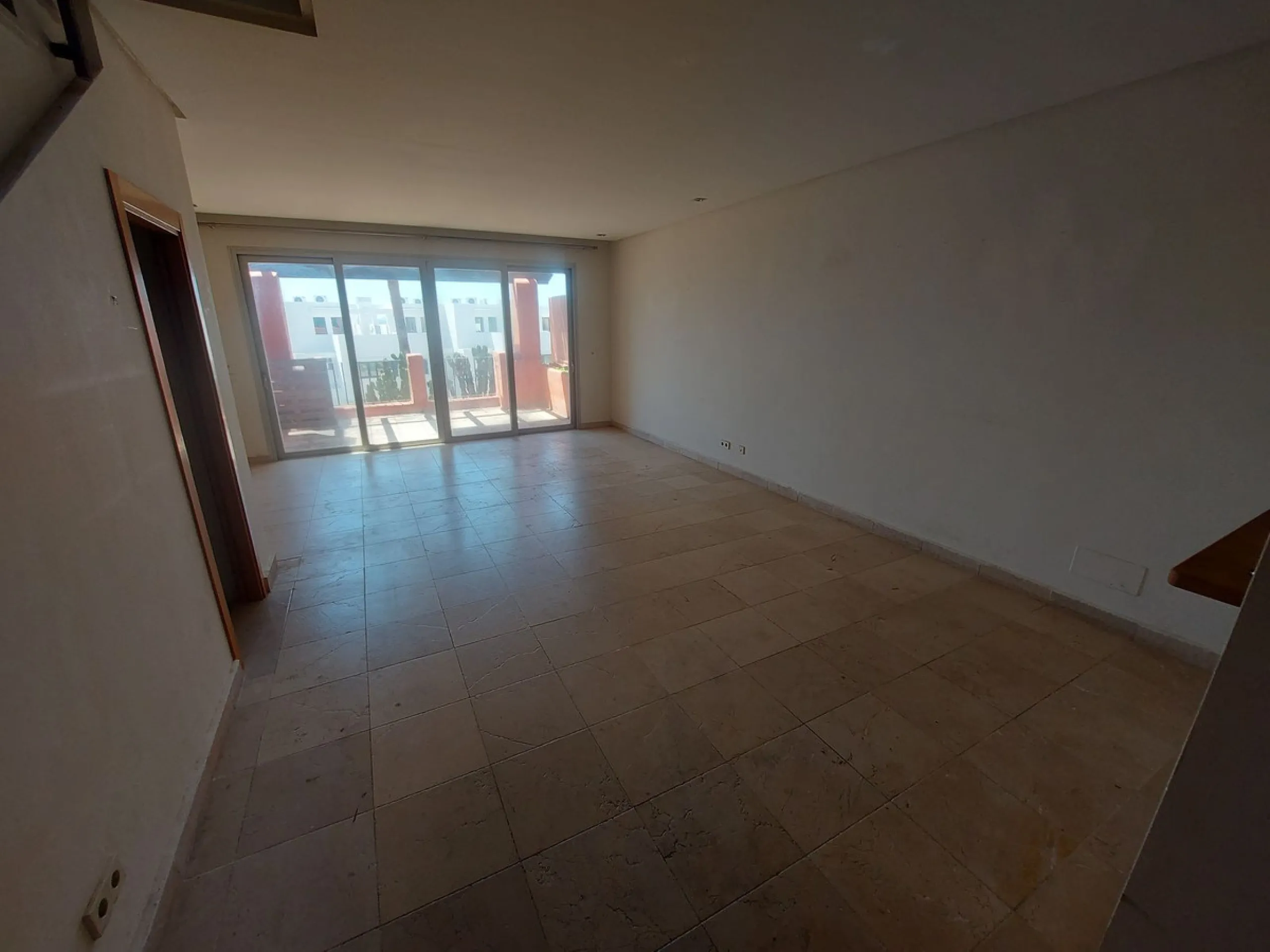 Large modern south facing un-furnished townhouse in a small development of only 46 houses.