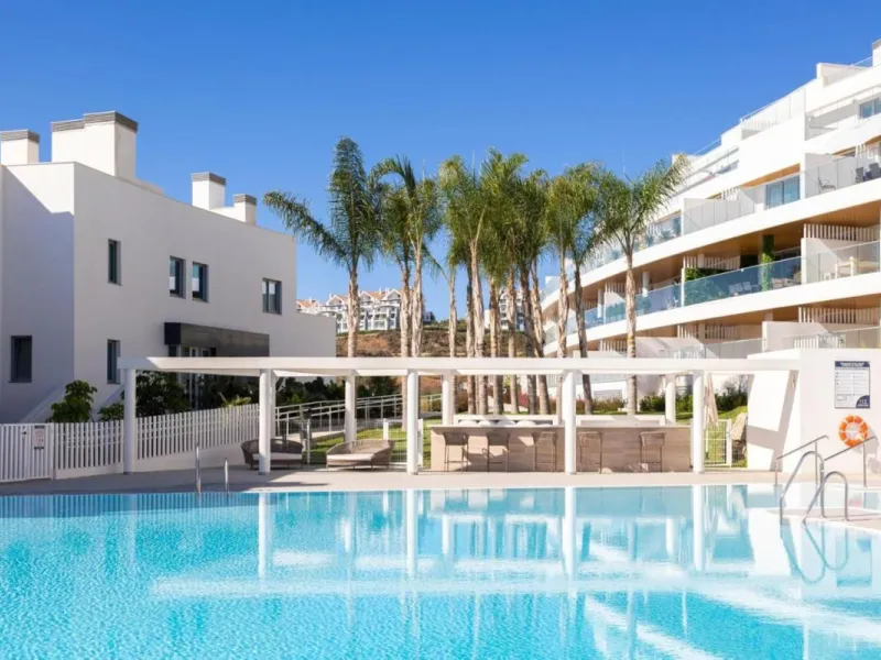 Welcome to One Residences, Calanova Golf, Mijas. This is a unique opportunity to purchase a spacious ground floor apartment with private garden and pool, and panoramic golf, sea and mountains views, and perfect south orientation. Ample living room with op
