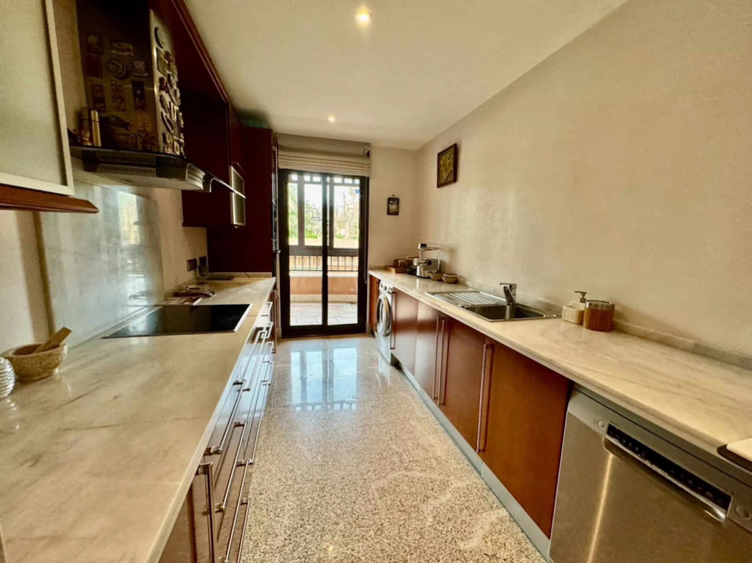 Modern beachfront apartment in prestigious gated complex, located in San Pedro de Alcantara.