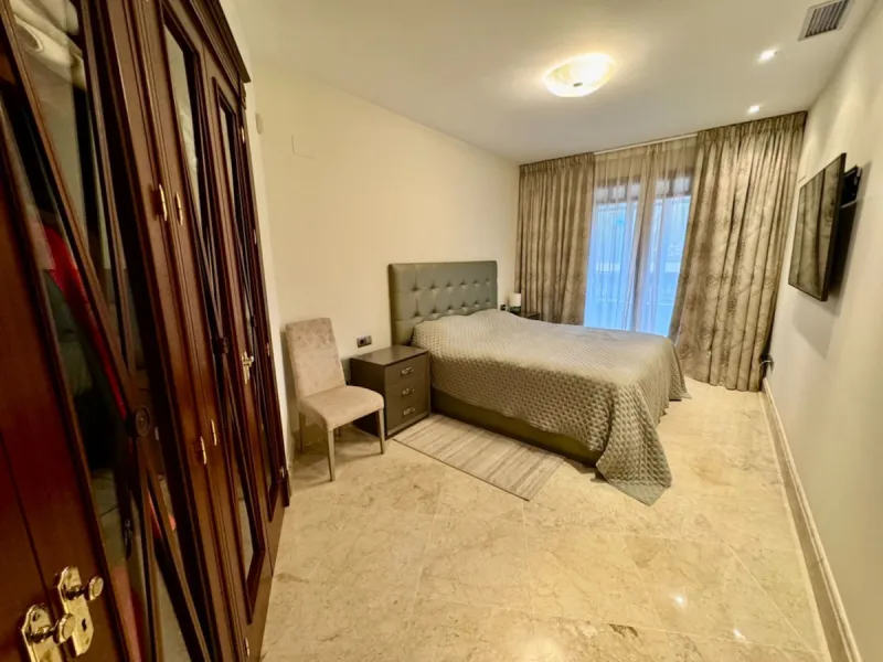 Modern beachfront apartment in prestigious gated complex, located in San Pedro de Alcantara.