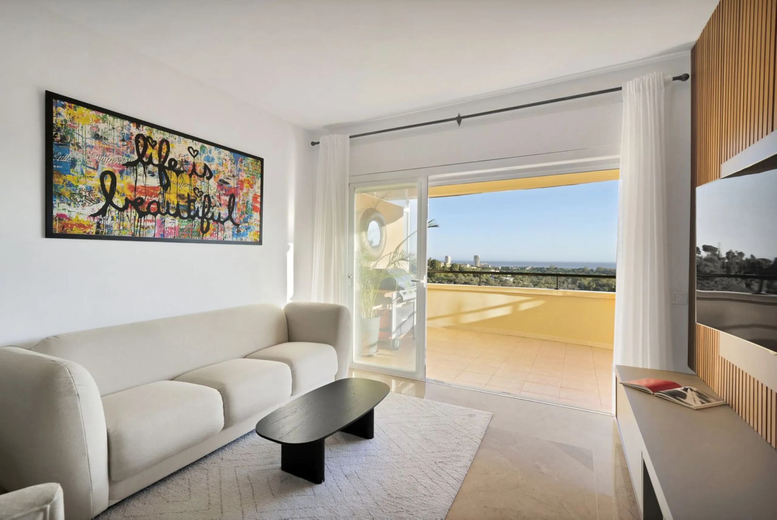 Located in the sought-after Elviria Hills community, this well-positioned 2-bedroom, 2-bathroom apartment offers stunning panoramic sea views and a full south-facing orientation. Situated in one of the best blocks of the development, this home provides a 