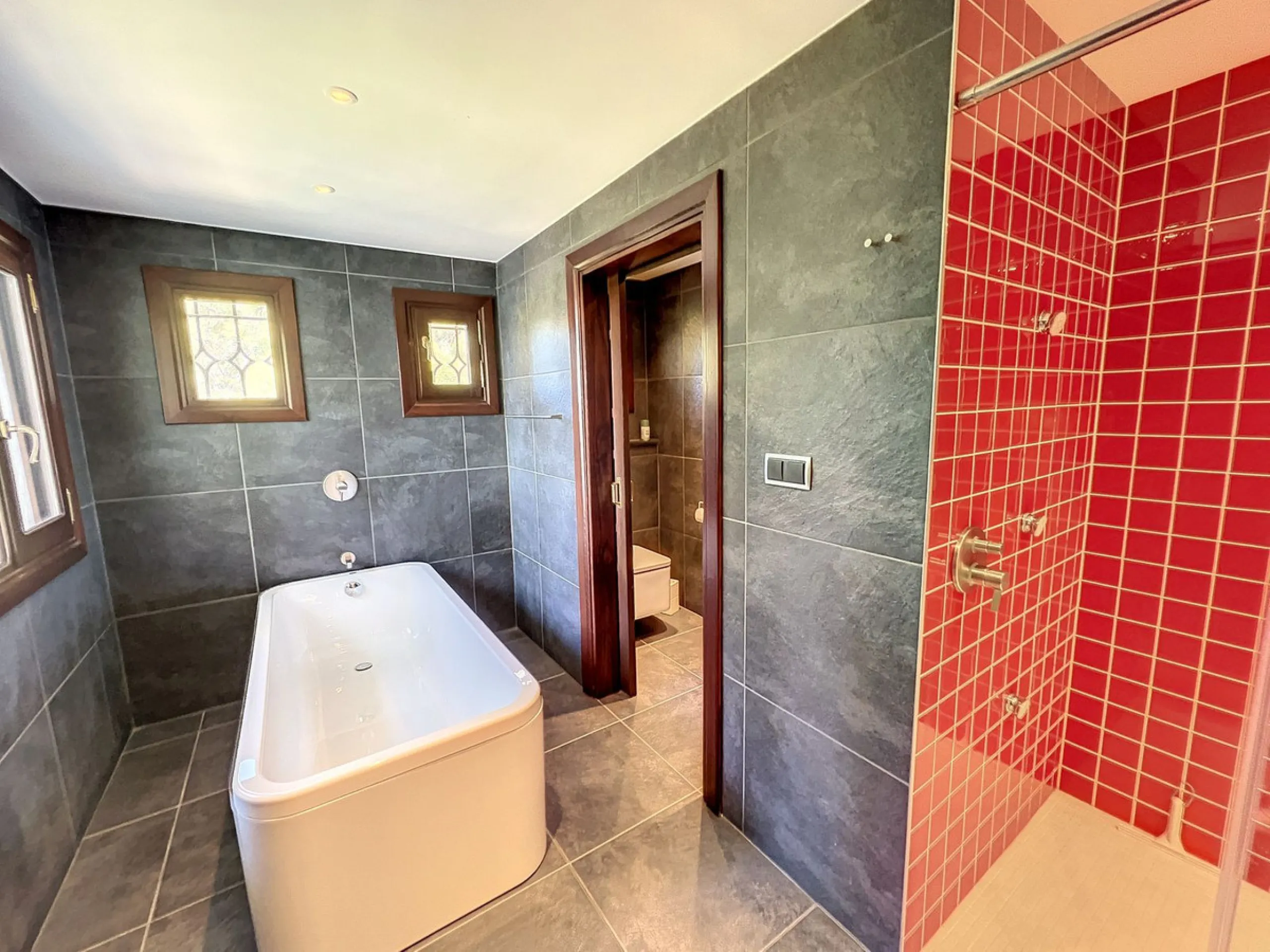 Tucked away in a beautiful corner of Mijas, this lovely villa offers breathtaking panoramic views that will truly impress. Perfectly designed for two families, it has three spacious bedrooms, plus an extra room with a double sofa bed, providing plenty of 