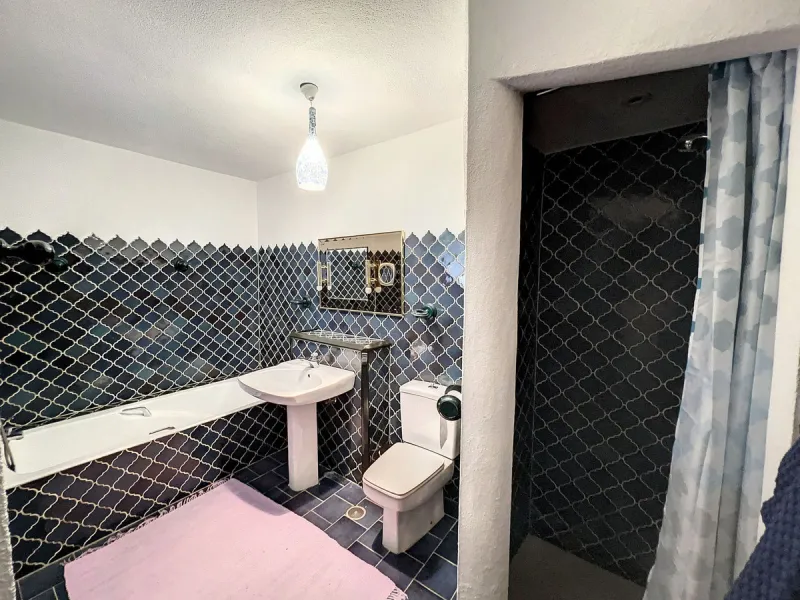 Tucked away in a beautiful corner of Mijas, this lovely villa offers breathtaking panoramic views that will truly impress. Perfectly designed for two families, it has three spacious bedrooms, plus an extra room with a double sofa bed, providing plenty of 