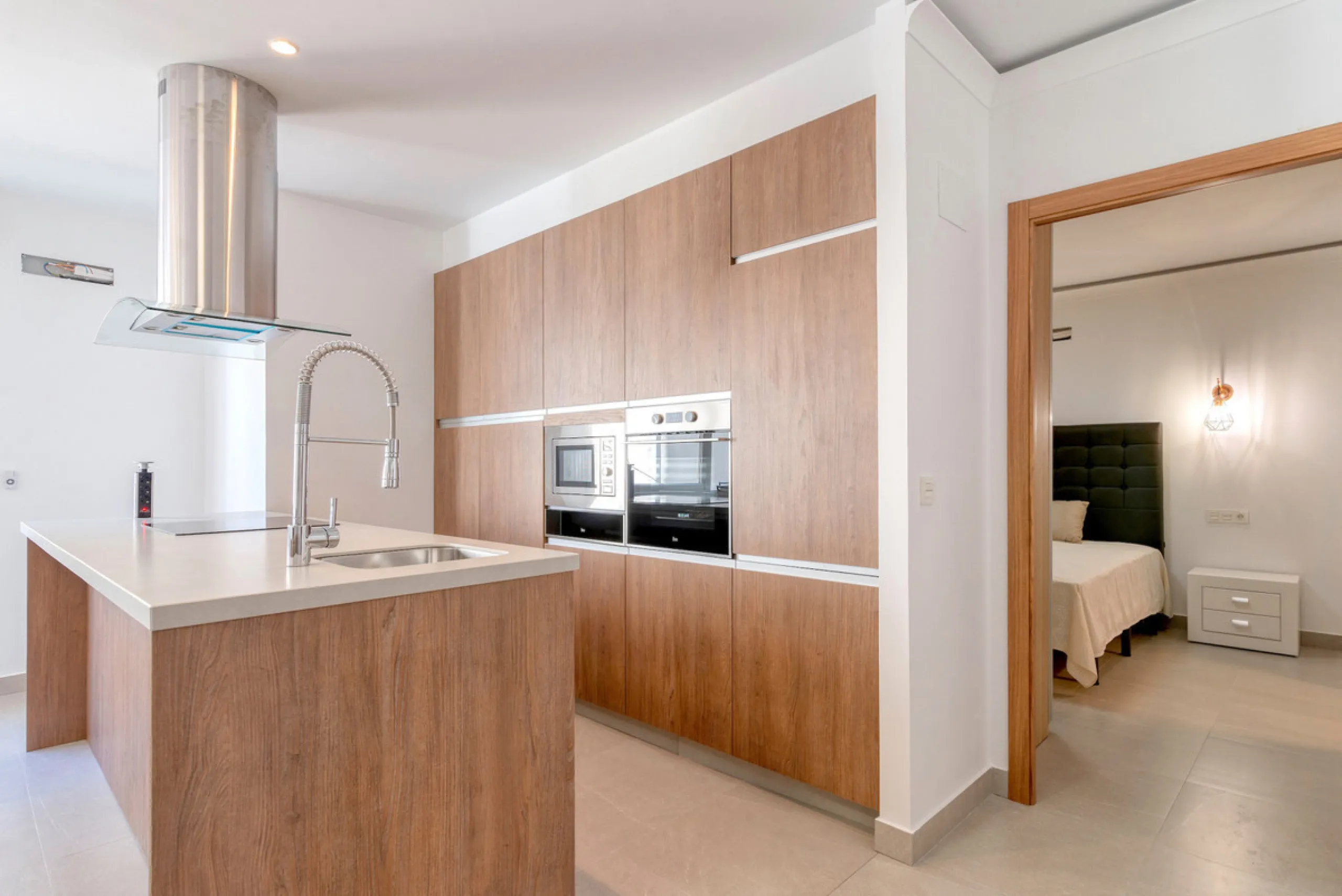 Presenting a perfectly finished Puerto Banus apartment, within steps of the bustling port but situated in a location that ensures tranquility. The home is accessed from the ground floor level by a lift that arrives within steps of the front door of this l