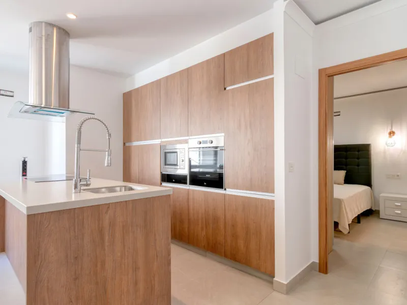 Presenting a perfectly finished Puerto Banus apartment, within steps of the bustling port but situated in a location that ensures tranquility. The home is accessed from the ground floor level by a lift that arrives within steps of the front door of this l