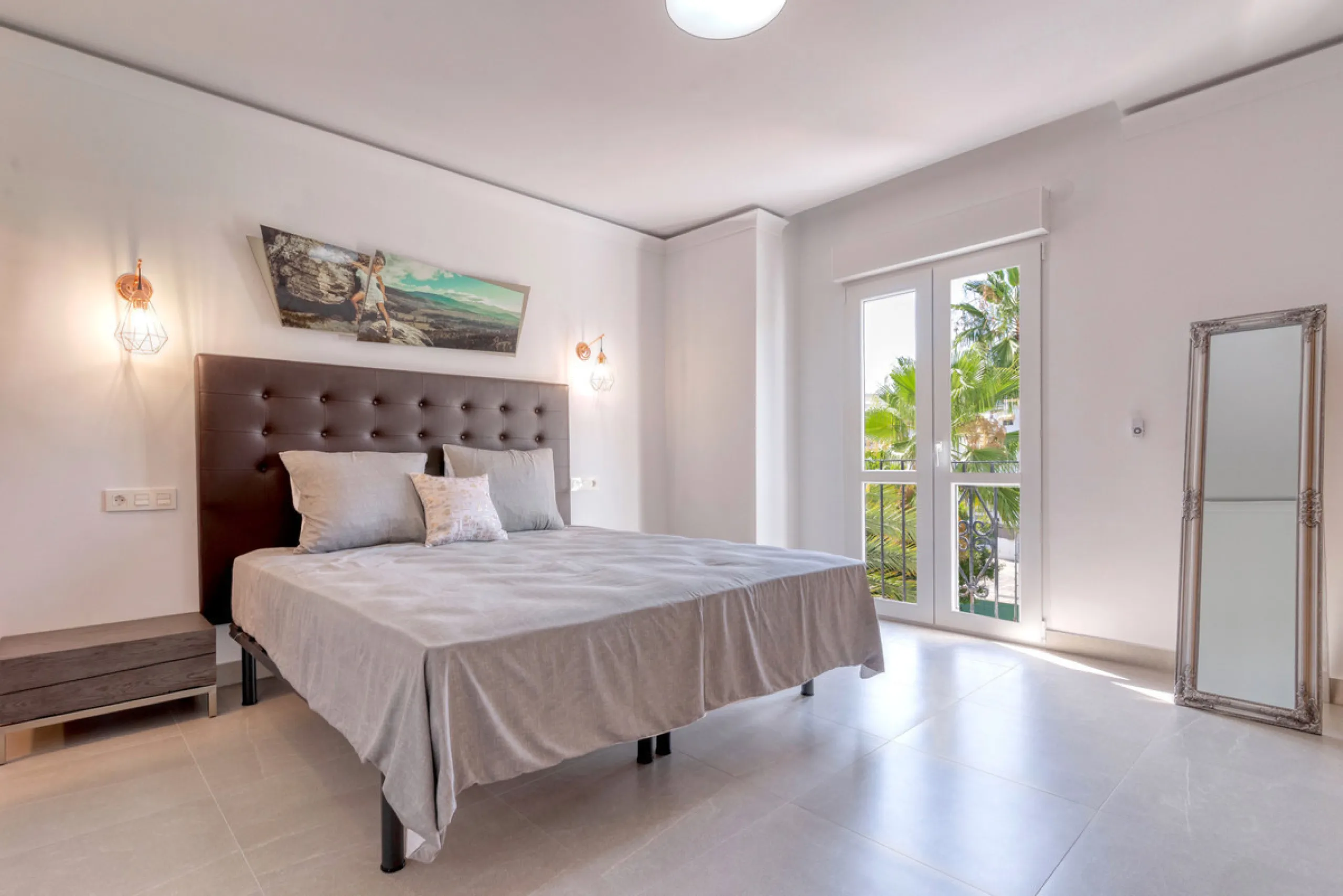 Presenting a perfectly finished Puerto Banus apartment, within steps of the bustling port but situated in a location that ensures tranquility. The home is accessed from the ground floor level by a lift that arrives within steps of the front door of this l
