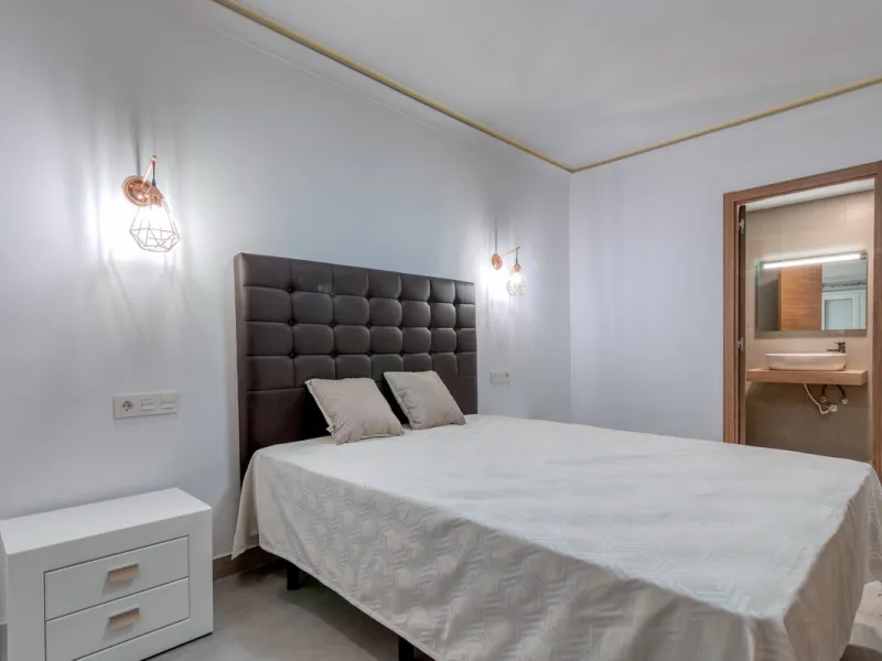 Presenting a perfectly finished Puerto Banus apartment, within steps of the bustling port but situated in a location that ensures tranquility. The home is accessed from the ground floor level by a lift that arrives within steps of the front door of this l