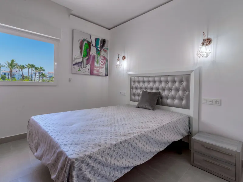 Presenting a perfectly finished Puerto Banus apartment, within steps of the bustling port but situated in a location that ensures tranquility. The home is accessed from the ground floor level by a lift that arrives within steps of the front door of this l