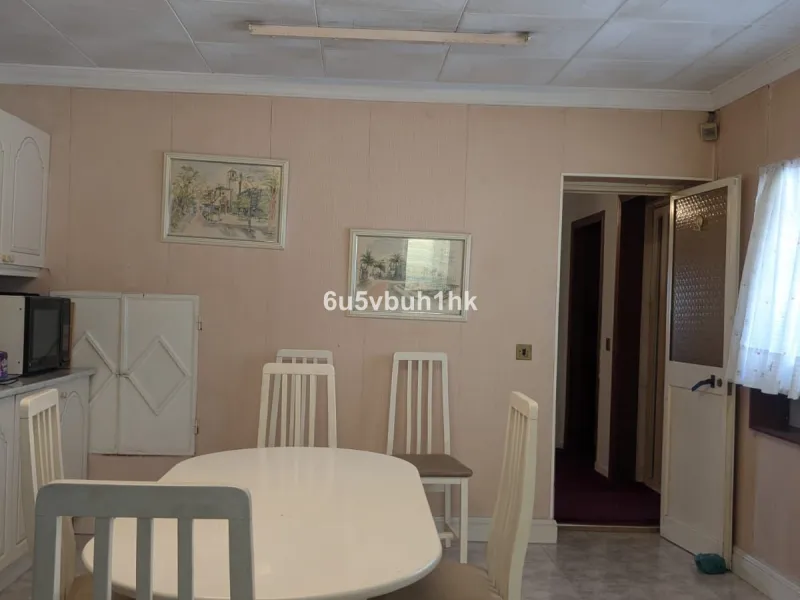 This very spacious one storey villa sits on a very large flat plot of land close to town and within walking distance of local restaurants. The rooms throughout this villa are sizeable, there are three bedrooms all ensuite, a lounge with a fireplace and a 