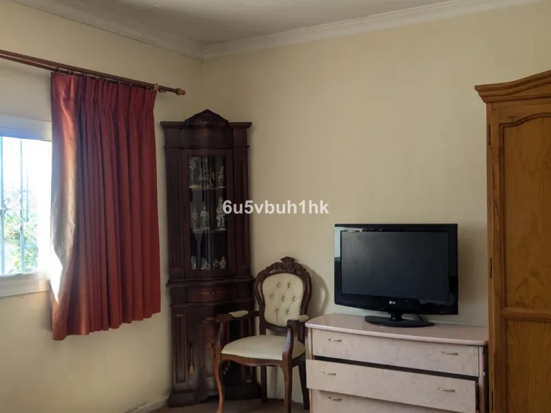 This very spacious one storey villa sits on a very large flat plot of land close to town and within walking distance of local restaurants. The rooms throughout this villa are sizeable, there are three bedrooms all ensuite, a lounge with a fireplace and a 