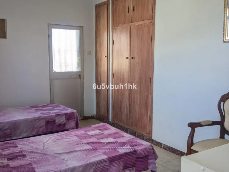This very spacious one storey villa sits on a very large flat plot of land close to town and within walking distance of local restaurants. The rooms throughout this villa are sizeable, there are three bedrooms all ensuite, a lounge with a fireplace and a 
