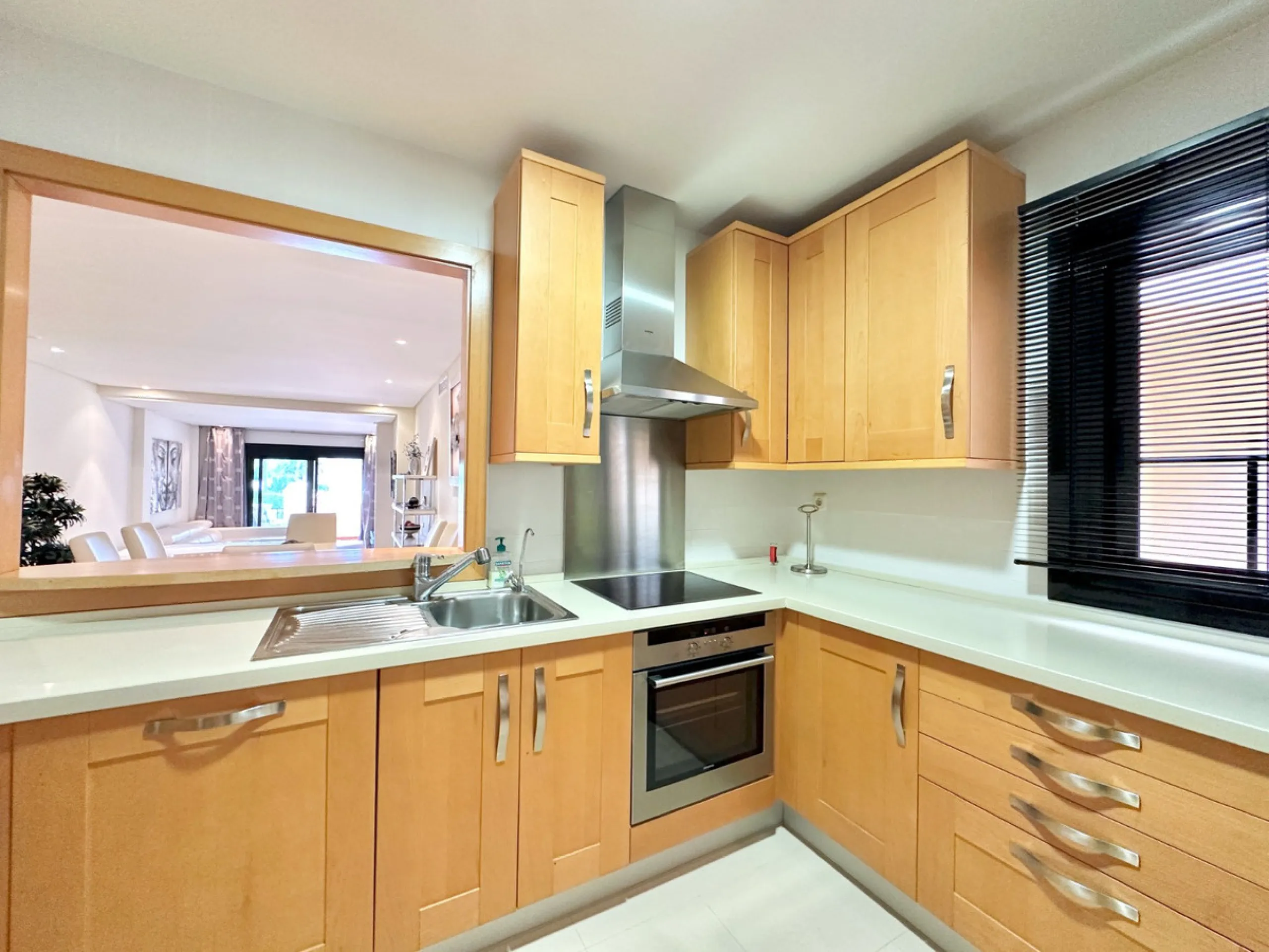 Nestled in the prestigious area of Las Mimosas, Marbella - Puerto Banus, this exquisite apartment offers a harmonious blend of comfort and convenience. Boasting a generous built area of 153m², including 143m² of interior space and a 30m² terrace, this pro