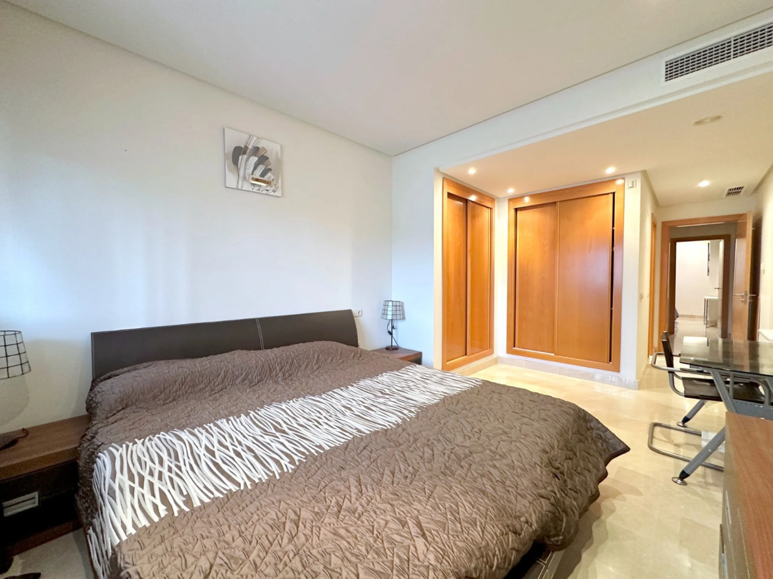 Nestled in the prestigious area of Las Mimosas, Marbella - Puerto Banus, this exquisite apartment offers a harmonious blend of comfort and convenience. Boasting a generous built area of 153m², including 143m² of interior space and a 30m² terrace, this pro