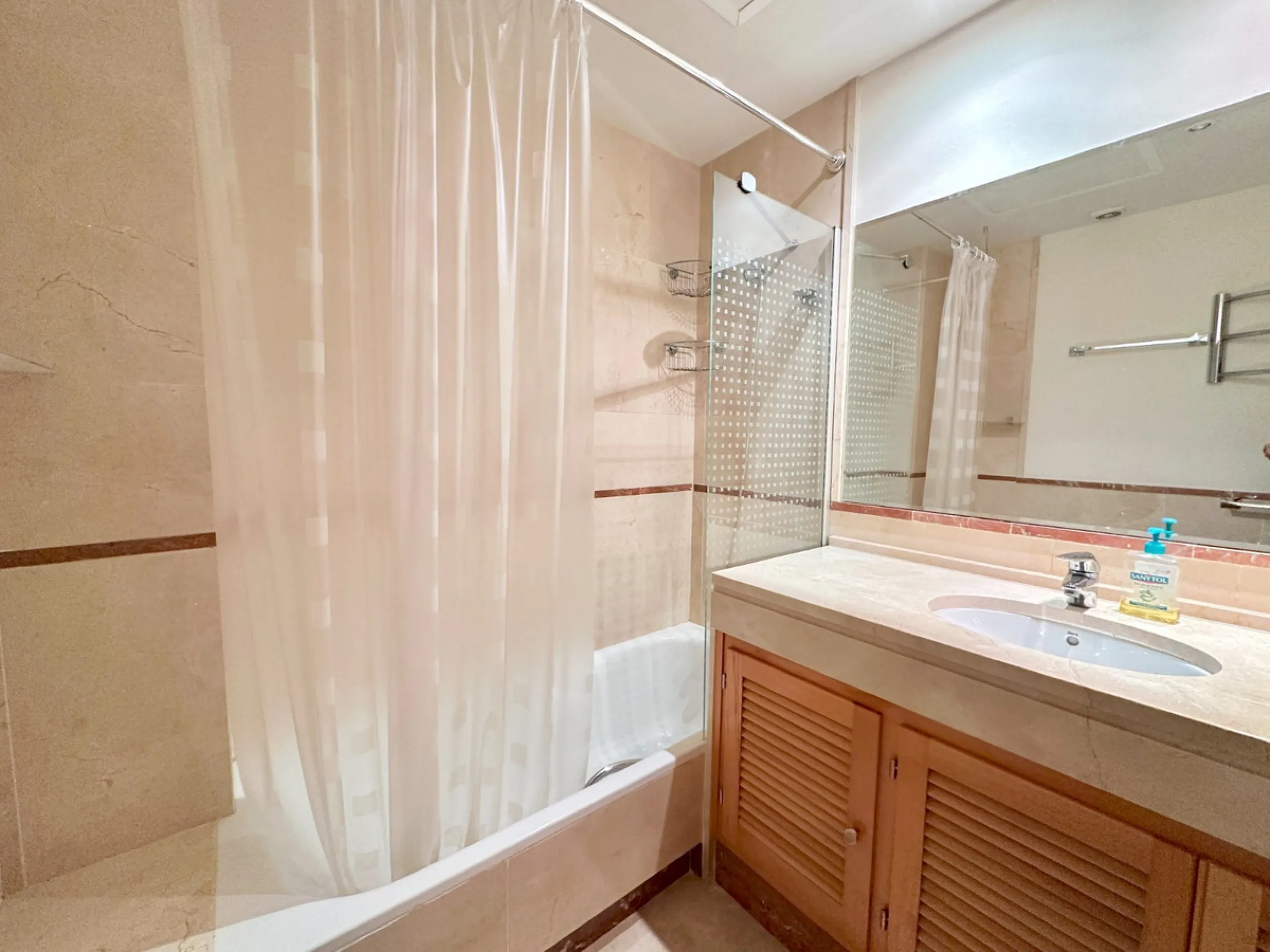 Nestled in the prestigious area of Las Mimosas, Marbella - Puerto Banus, this exquisite apartment offers a harmonious blend of comfort and convenience. Boasting a generous built area of 153m², including 143m² of interior space and a 30m² terrace, this pro