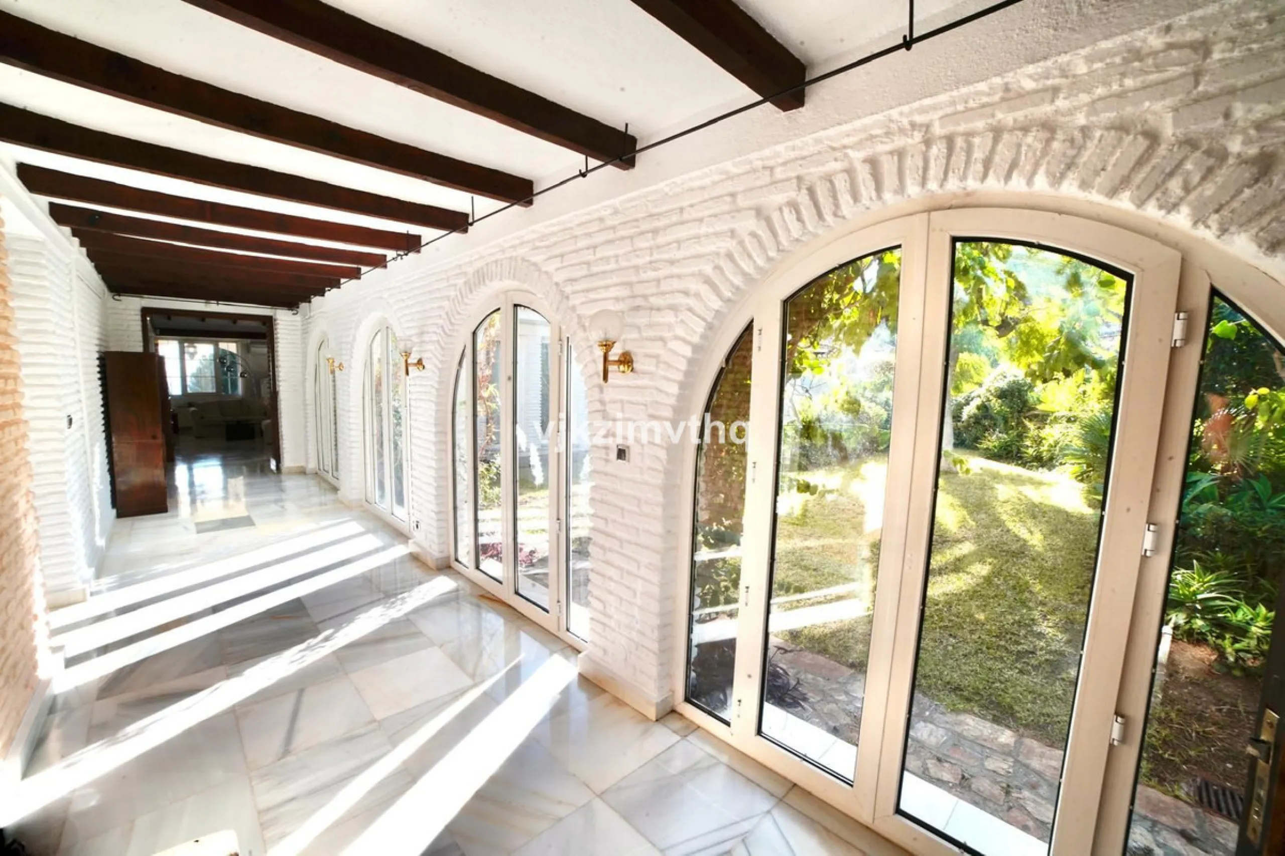 Located in the prestigious and historically significant Rancho Domingo, this exceptional single-story residence offers a rare opportunity to own a home in one of Costa del Sol's most iconic urbanizations. Designed by a student of Frank Lloyd Wright, Ranch