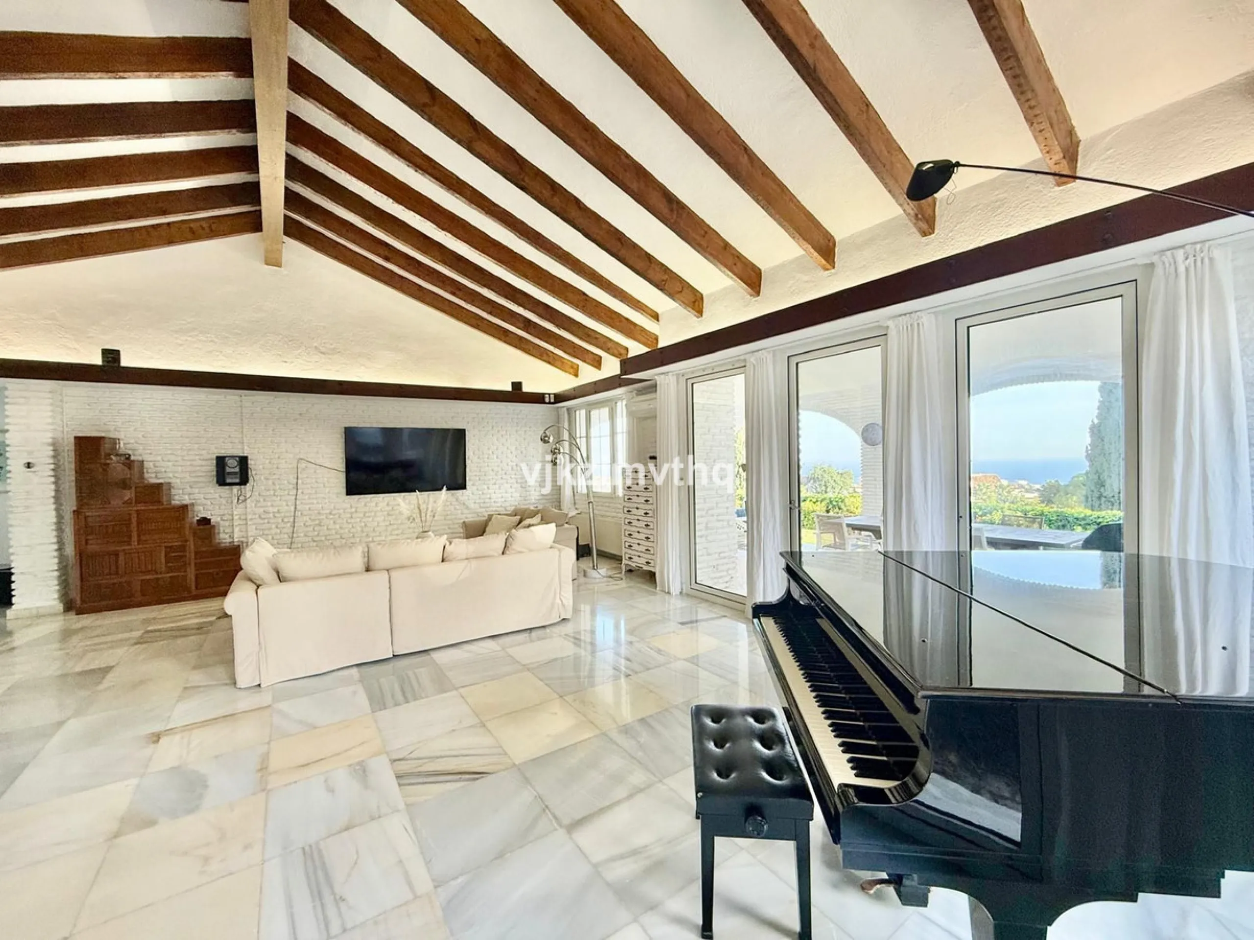Located in the prestigious and historically significant Rancho Domingo, this exceptional single-story residence offers a rare opportunity to own a home in one of Costa del Sol's most iconic urbanizations. Designed by a student of Frank Lloyd Wright, Ranch