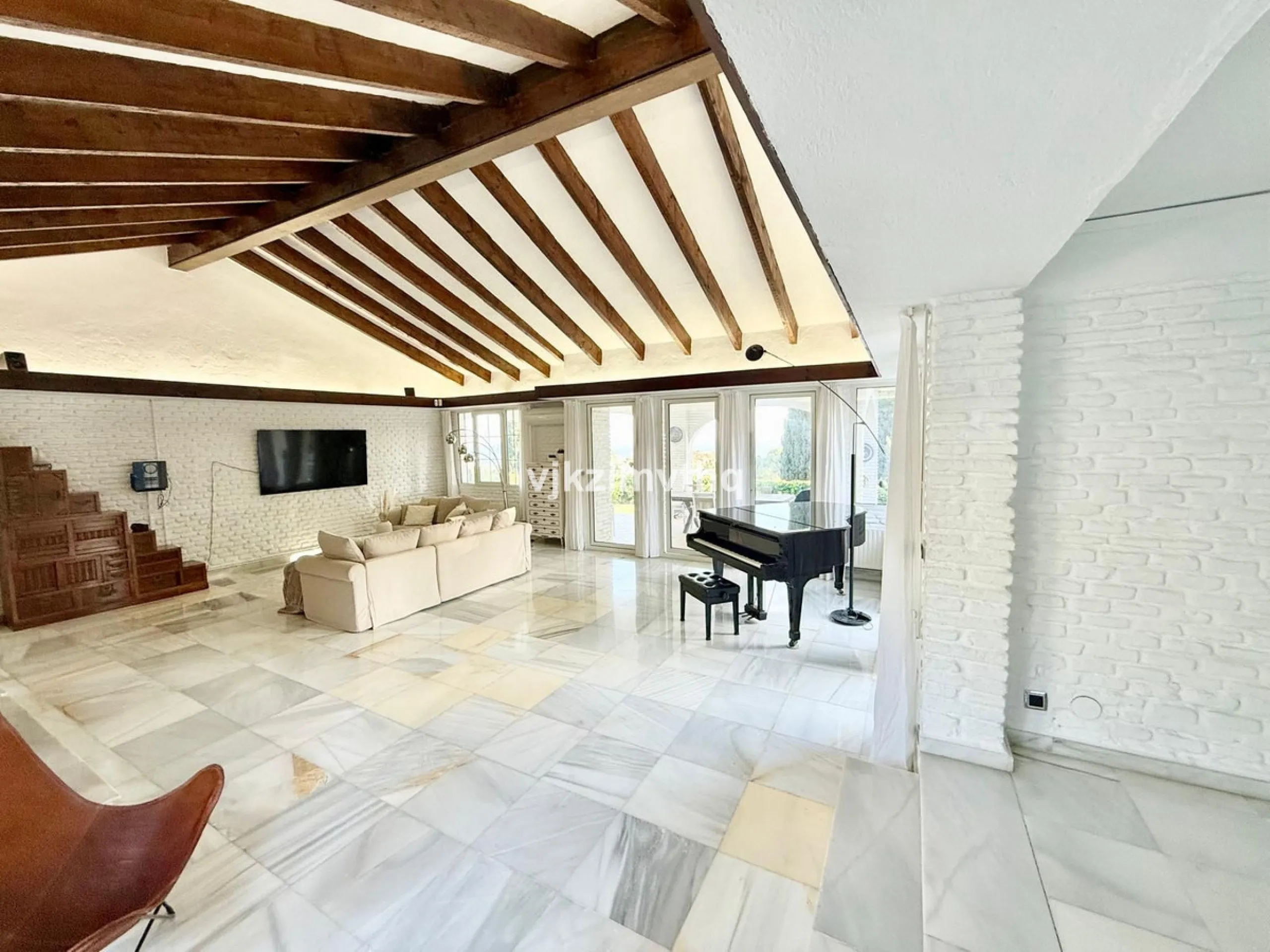 Located in the prestigious and historically significant Rancho Domingo, this exceptional single-story residence offers a rare opportunity to own a home in one of Costa del Sol's most iconic urbanizations. Designed by a student of Frank Lloyd Wright, Ranch