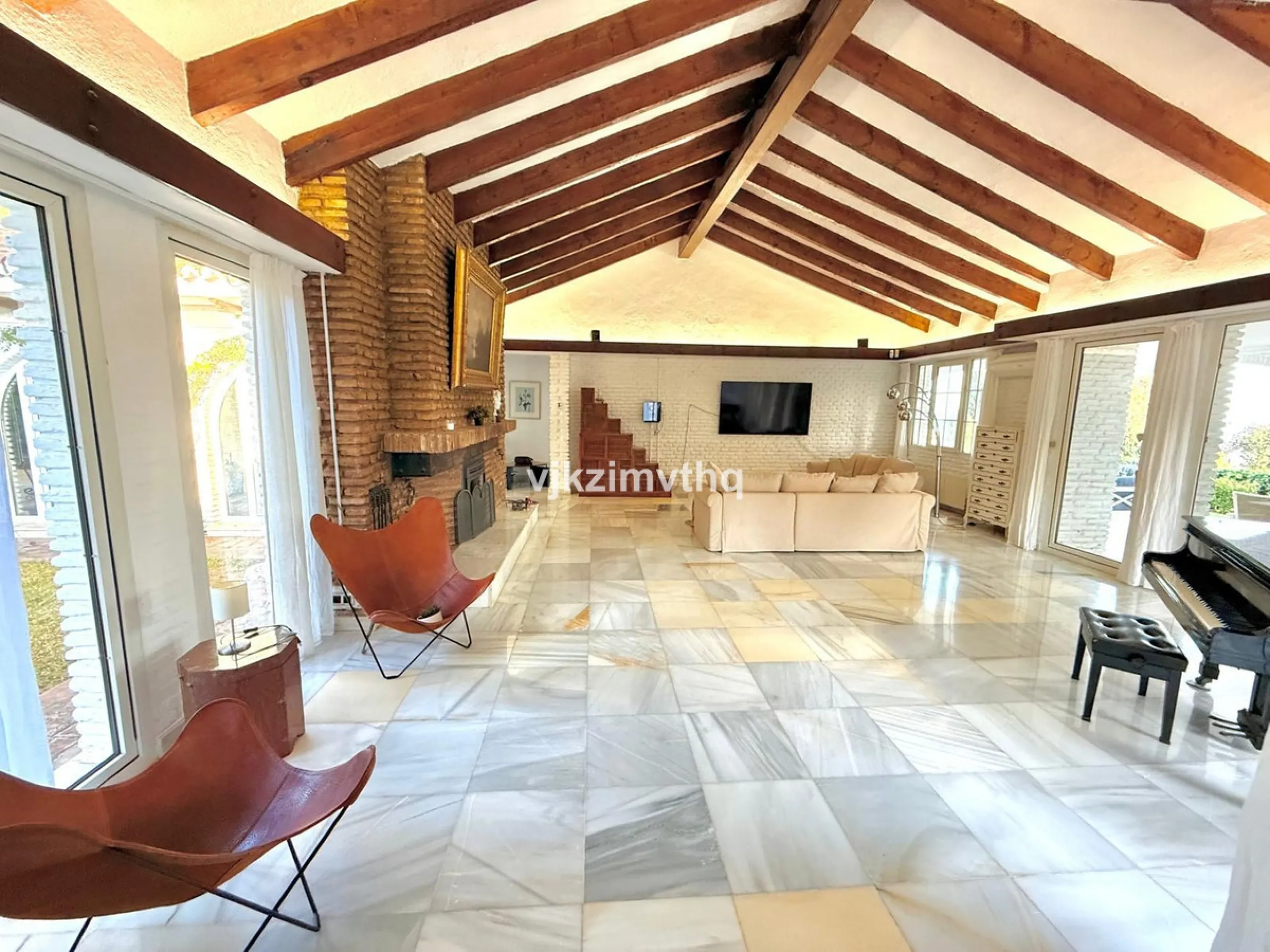 Located in the prestigious and historically significant Rancho Domingo, this exceptional single-story residence offers a rare opportunity to own a home in one of Costa del Sol's most iconic urbanizations. Designed by a student of Frank Lloyd Wright, Ranch