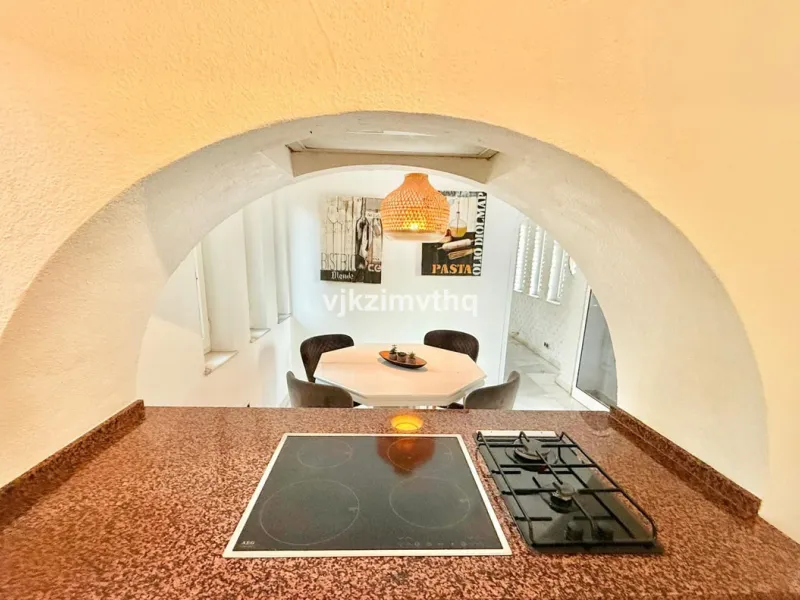 Located in the prestigious and historically significant Rancho Domingo, this exceptional single-story residence offers a rare opportunity to own a home in one of Costa del Sol's most iconic urbanizations. Designed by a student of Frank Lloyd Wright, Ranch