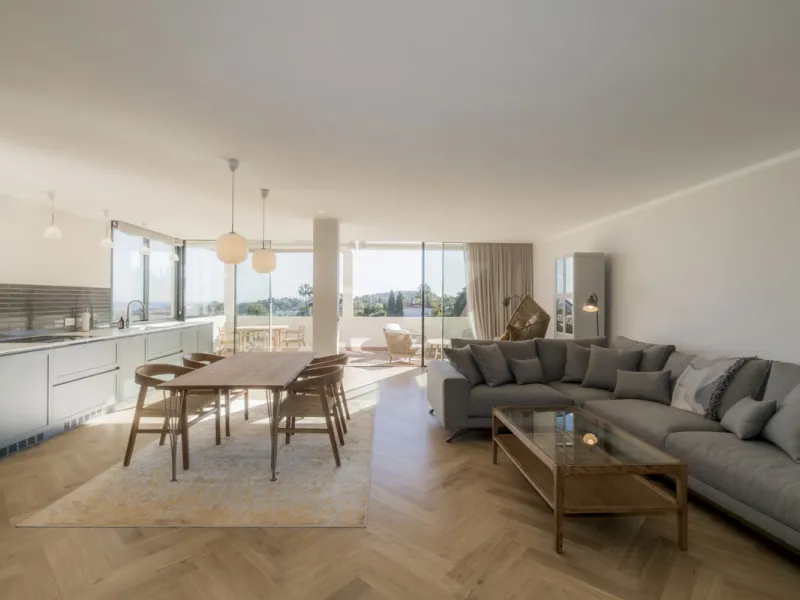 Step into luxury with this newly renovated 2-bedroom, 2-bathroom middle-floor apartment in the heart of Nueva Andalucía. Designed for modern living, it features a state-of-the-art Gaggenau kitchen, elegant herringbone wood flooring, and a spacious southwe