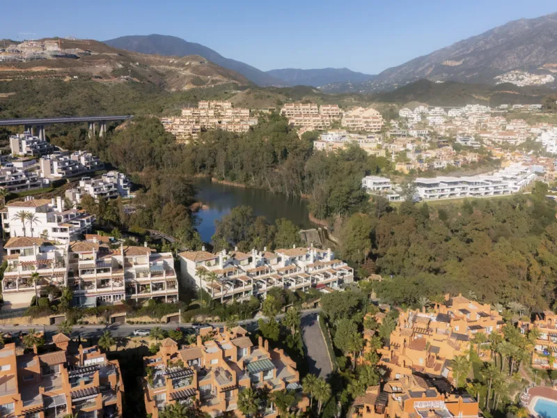 Step into luxury with this newly renovated 2-bedroom, 2-bathroom middle-floor apartment in the heart of Nueva Andalucía. Designed for modern living, it features a state-of-the-art Gaggenau kitchen, elegant herringbone wood flooring, and a spacious southwe