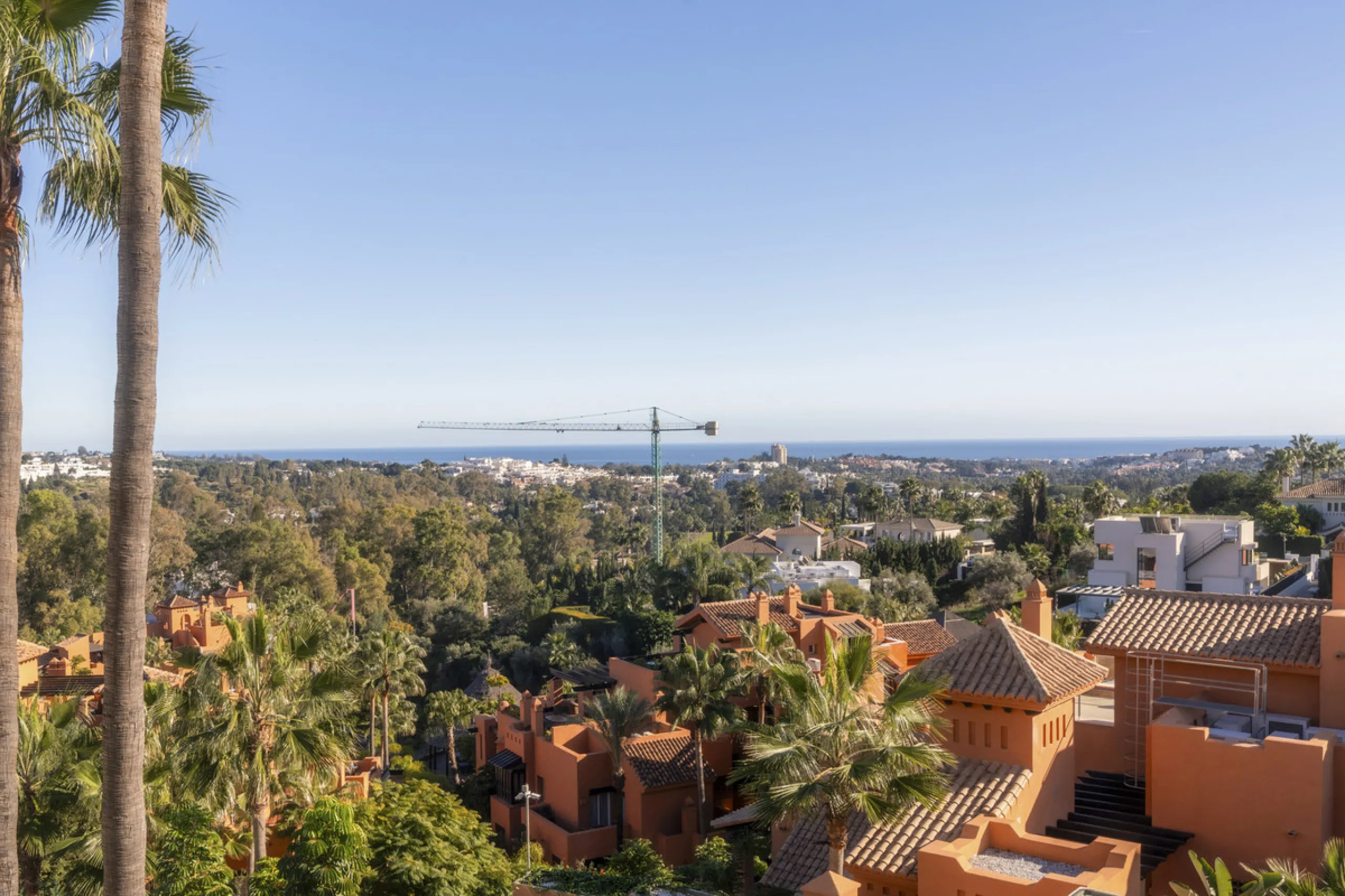 Step into luxury with this newly renovated 2-bedroom, 2-bathroom middle-floor apartment in the heart of Nueva Andalucía. Designed for modern living, it features a state-of-the-art Gaggenau kitchen, elegant herringbone wood flooring, and a spacious southwe