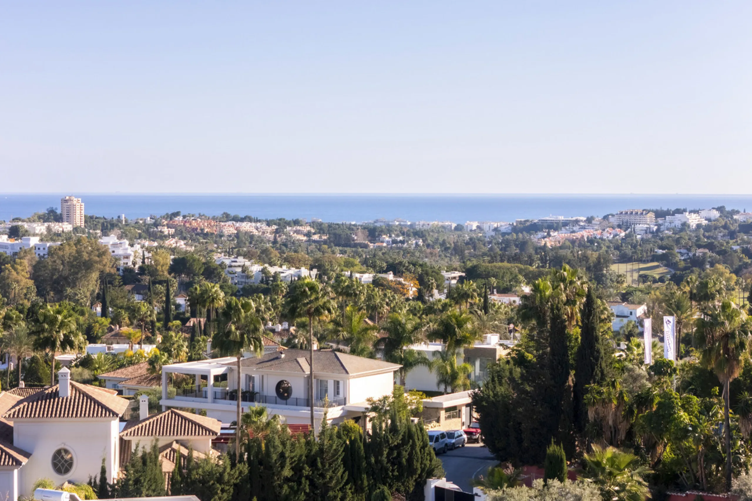 Step into luxury with this newly renovated 2-bedroom, 2-bathroom middle-floor apartment in the heart of Nueva Andalucía. Designed for modern living, it features a state-of-the-art Gaggenau kitchen, elegant herringbone wood flooring, and a spacious southwe