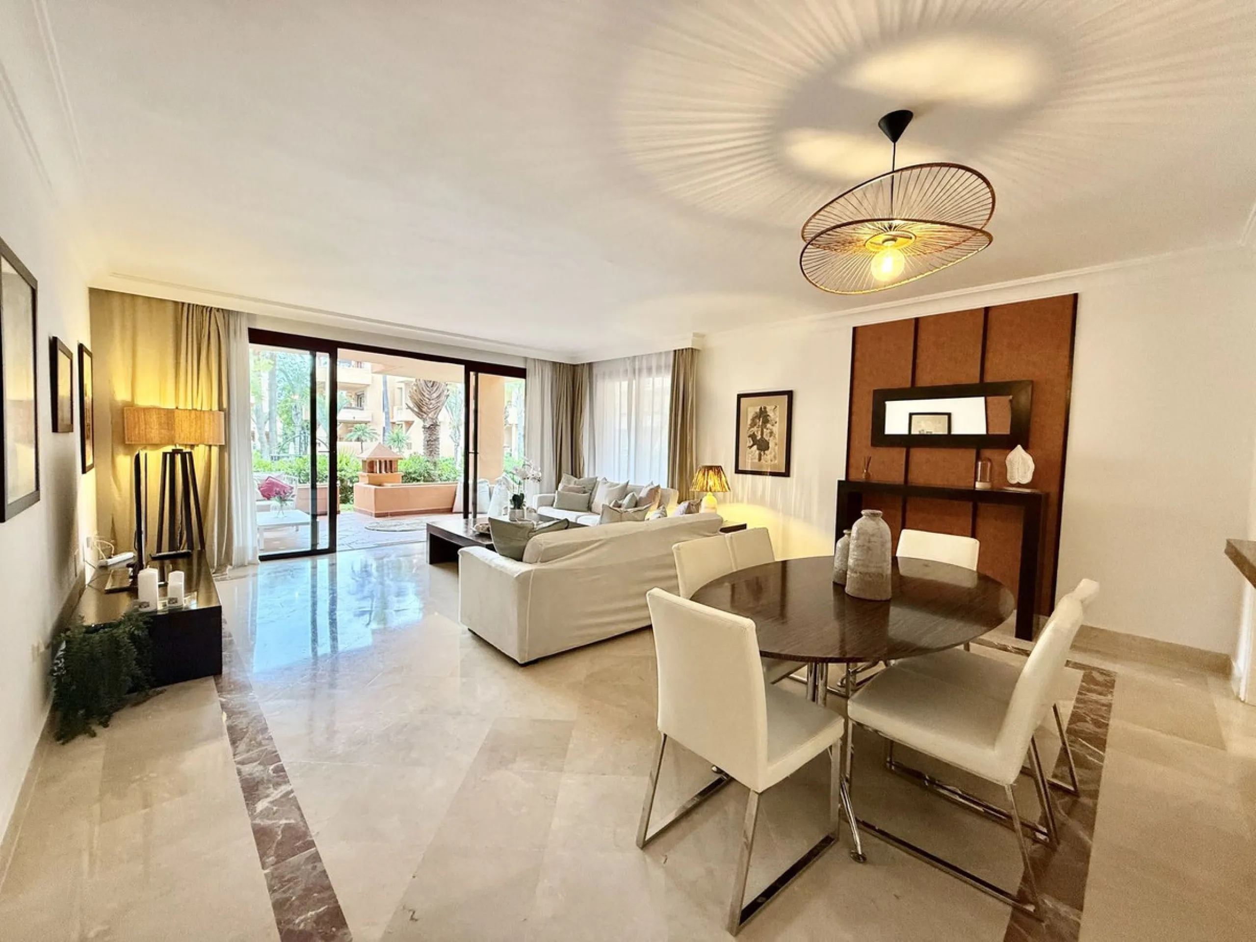 This magnificent frontline beach ground floor apartment is part of an exclusive gated community of only 80 homes. Surrounded by lush mature tropical gardens, it offers a tranquil and sophisticated ambience. The property includes a private underground park