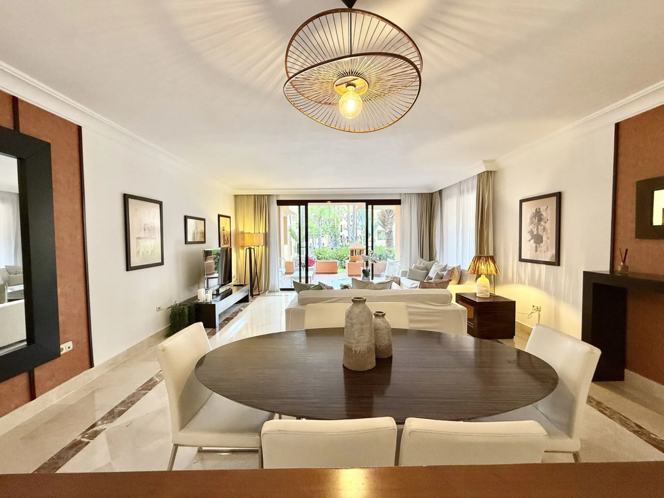 This magnificent frontline beach ground floor apartment is part of an exclusive gated community of only 80 homes. Surrounded by lush mature tropical gardens, it offers a tranquil and sophisticated ambience. The property includes a private underground park