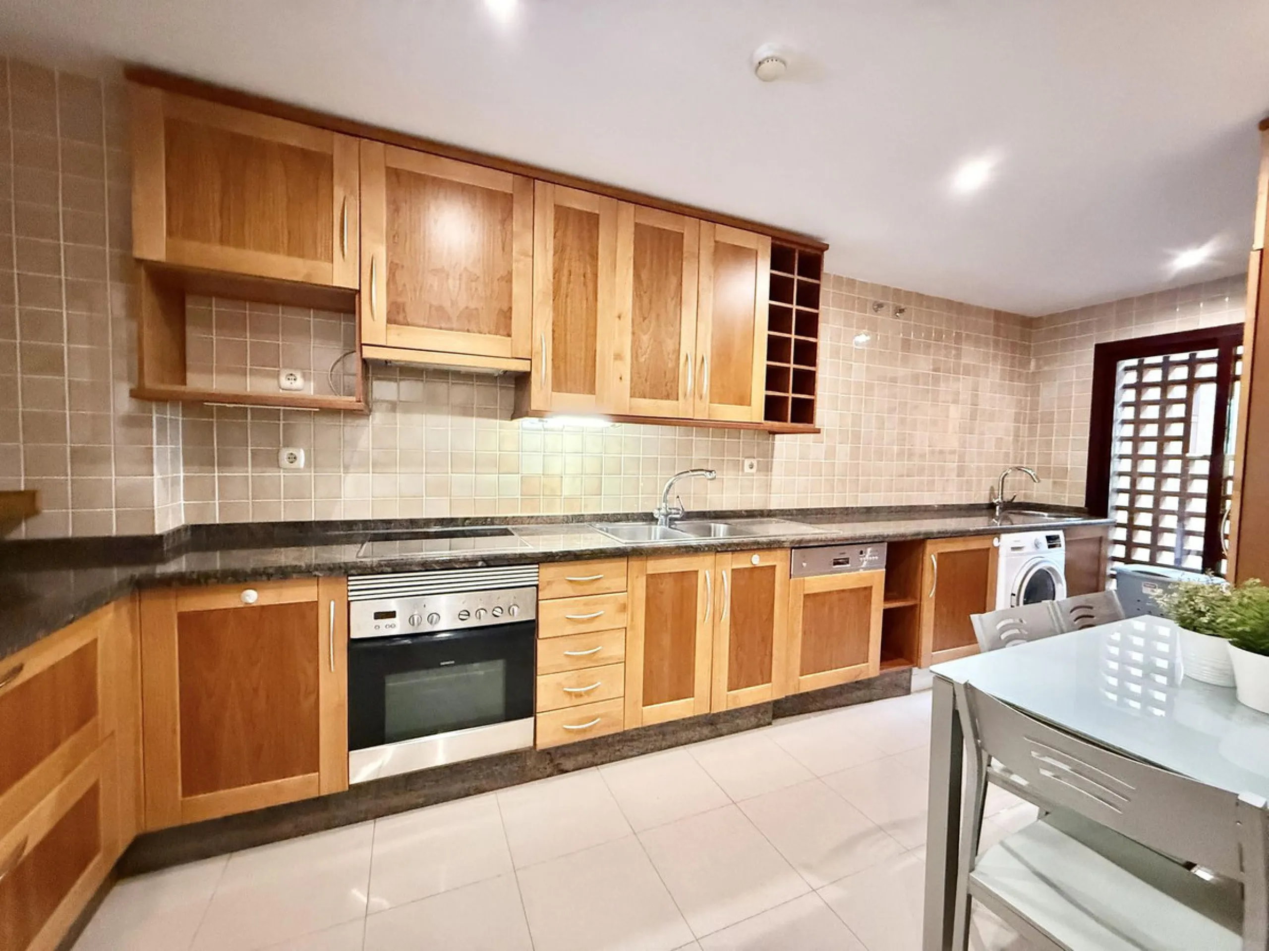 This magnificent frontline beach ground floor apartment is part of an exclusive gated community of only 80 homes. Surrounded by lush mature tropical gardens, it offers a tranquil and sophisticated ambience. The property includes a private underground park