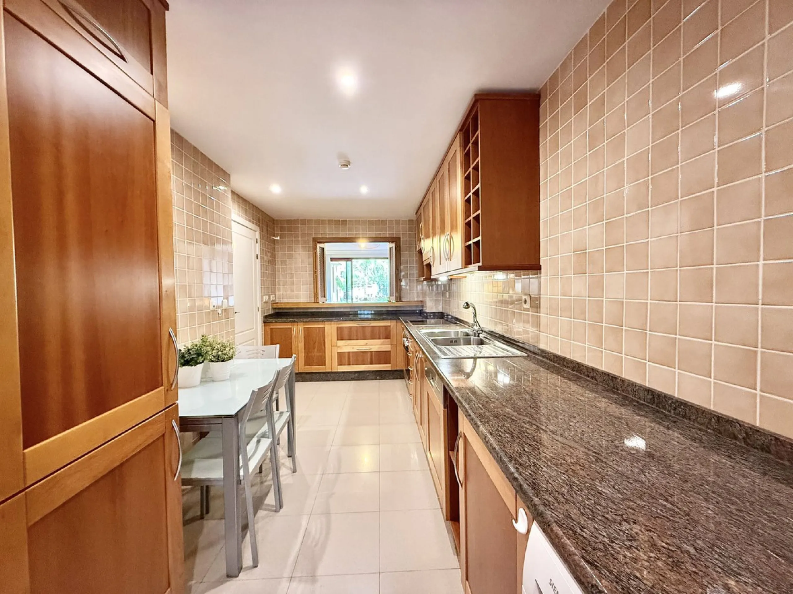 This magnificent frontline beach ground floor apartment is part of an exclusive gated community of only 80 homes. Surrounded by lush mature tropical gardens, it offers a tranquil and sophisticated ambience. The property includes a private underground park