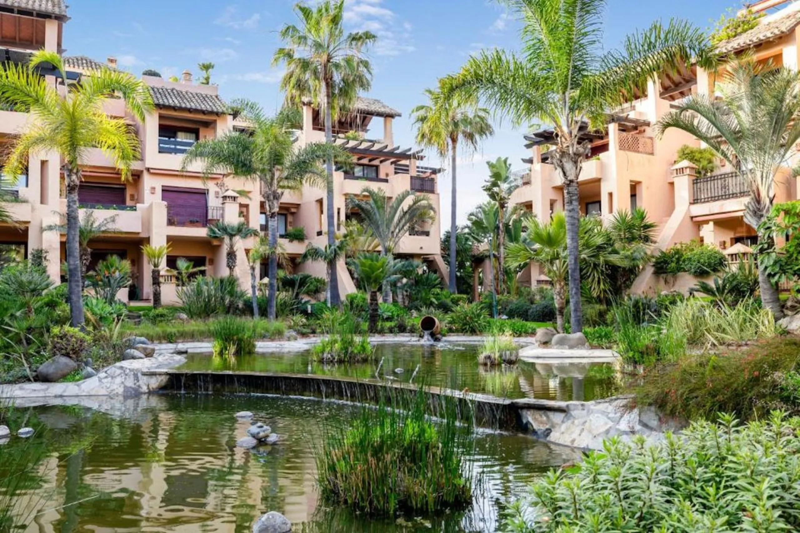 This magnificent frontline beach ground floor apartment is part of an exclusive gated community of only 80 homes. Surrounded by lush mature tropical gardens, it offers a tranquil and sophisticated ambience. The property includes a private underground park