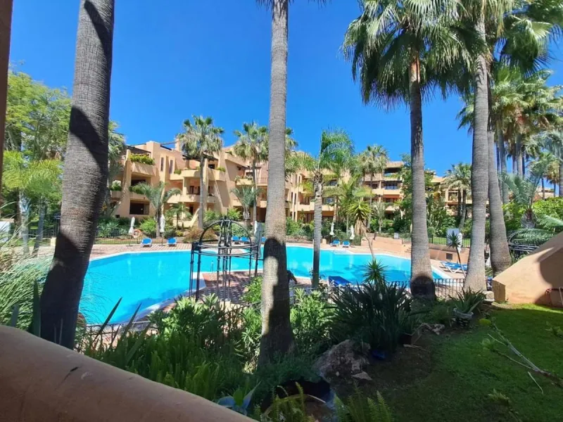 This magnificent frontline beach ground floor apartment is part of an exclusive gated community of only 80 homes. Surrounded by lush mature tropical gardens, it offers a tranquil and sophisticated ambience. The property includes a private underground park
