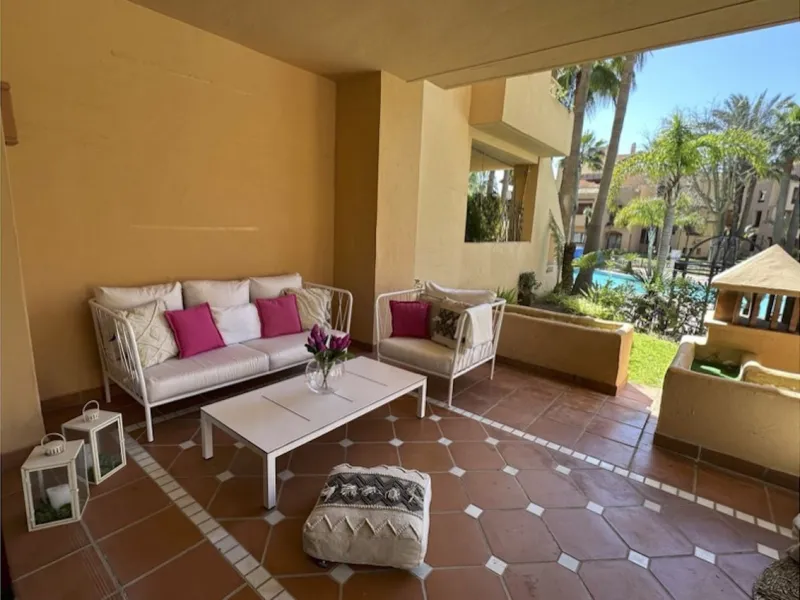 This magnificent frontline beach ground floor apartment is part of an exclusive gated community of only 80 homes. Surrounded by lush mature tropical gardens, it offers a tranquil and sophisticated ambience. The property includes a private underground park