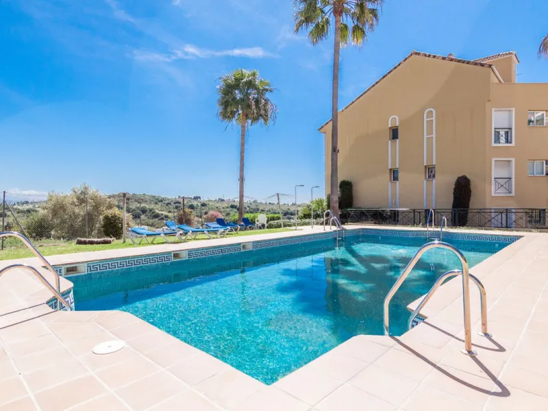 Welcome to this delightful apartment located in the serene urbanization of Bel-Air, Estepona. Offering breathtaking sea and mountain views, this cozy residence is the perfect retreat for those seeking tranquility and comfort.