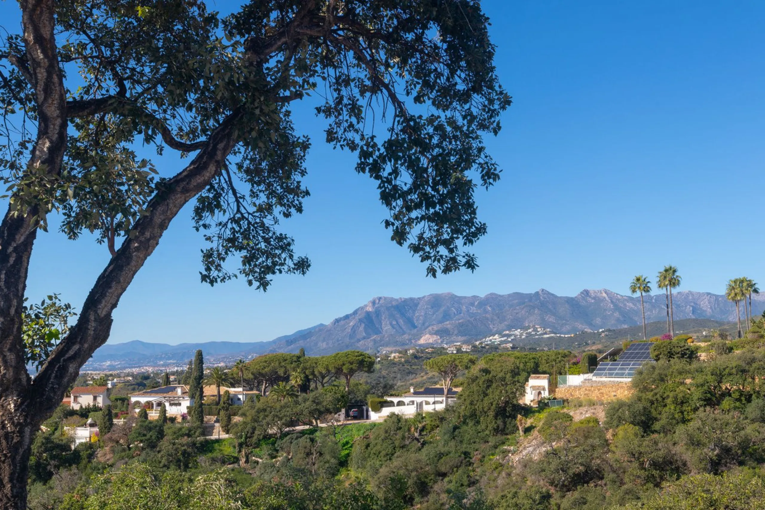 Exceptional villa located in residential Elviria reformed to a very high standard with stunning panoramic sea and mountain views.