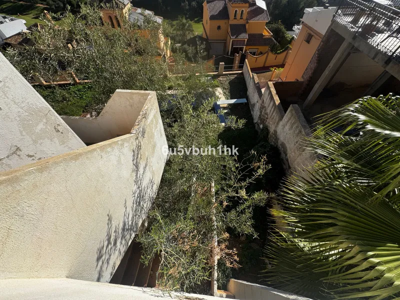 Welcome to this charming villa nestled in the prestigious neighborhood of El Candado, Malaga, where serenity meets elegance. This splendid property presents the perfect canvas for creating your dream home, offering a unique blend of privacy, breathtaking 