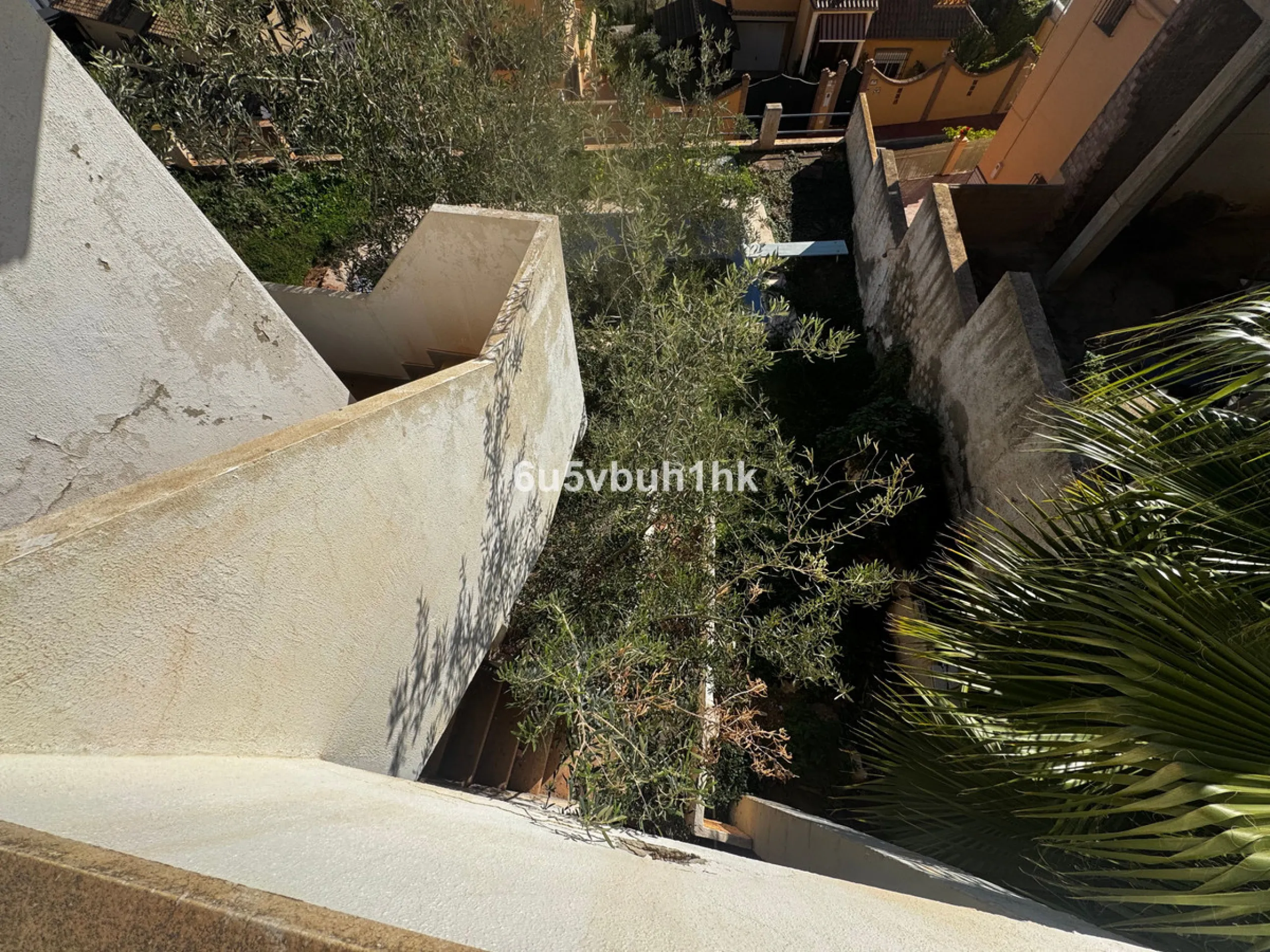 Welcome to this charming villa nestled in the prestigious neighborhood of El Candado, Malaga, where serenity meets elegance. This splendid property presents the perfect canvas for creating your dream home, offering a unique blend of privacy, breathtaking 