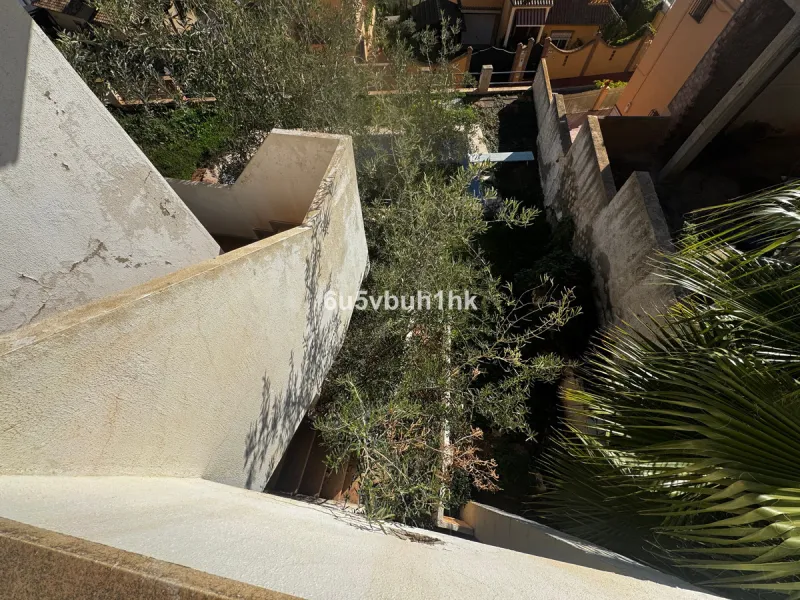 Welcome to this charming villa nestled in the prestigious neighborhood of El Candado, Malaga, where serenity meets elegance. This splendid property presents the perfect canvas for creating your dream home, offering a unique blend of privacy, breathtaking 