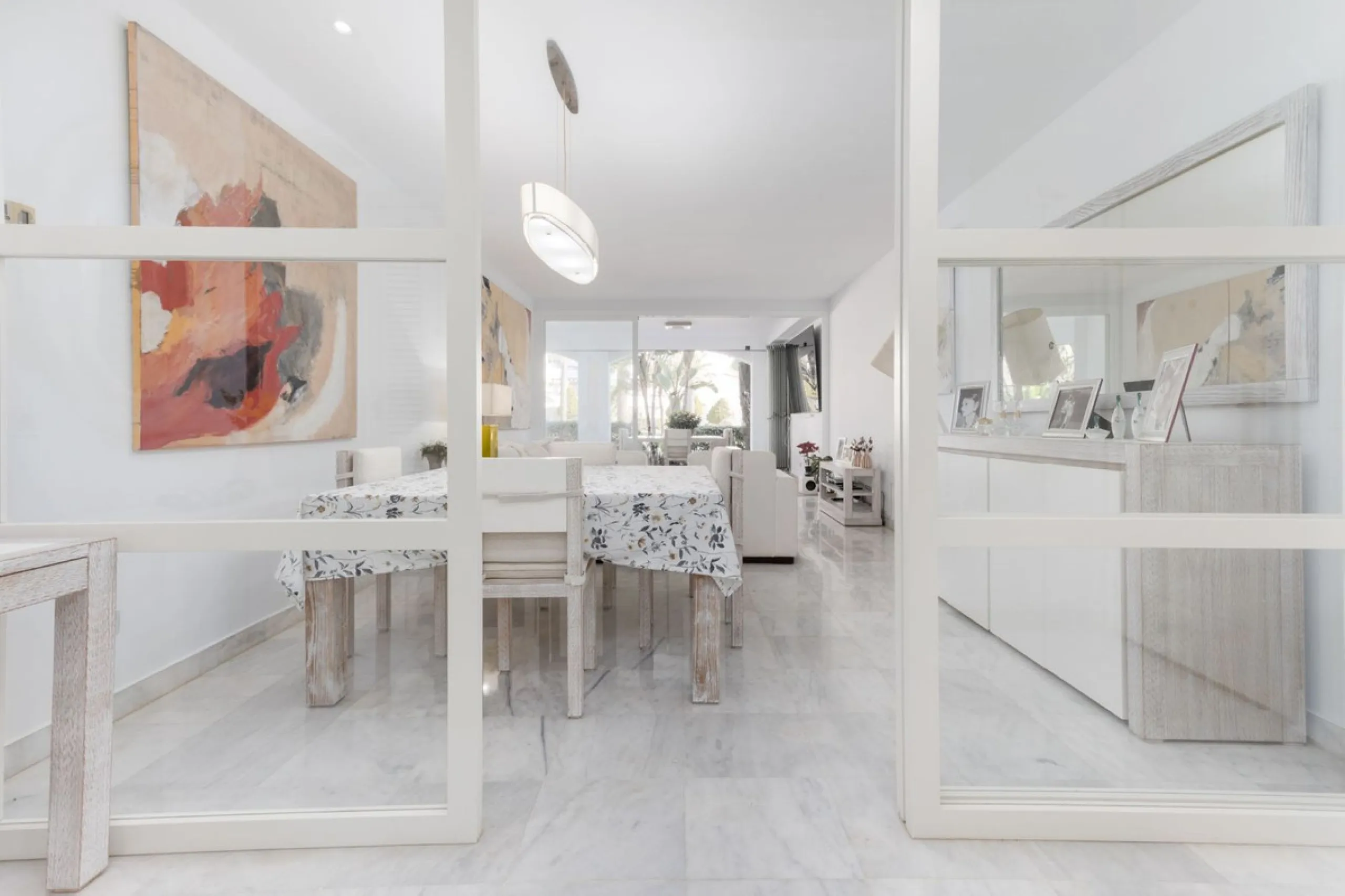 Discover luxury and comfort in this exclusive ground floor apartment in the prestigious urbanization of Las Adelfas!.