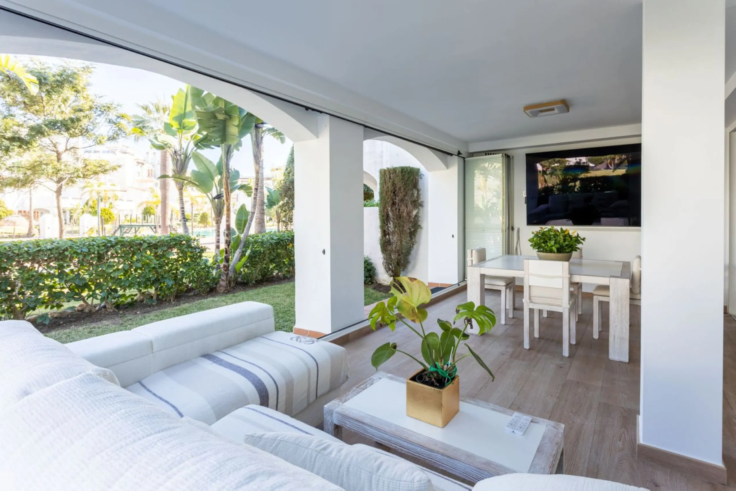 Discover luxury and comfort in this exclusive ground floor apartment in the prestigious urbanization of Las Adelfas!.
