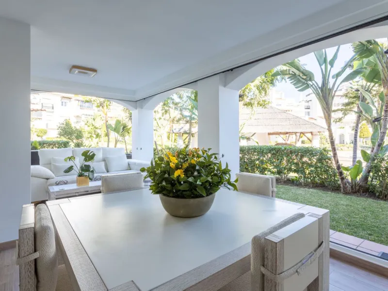 Discover luxury and comfort in this exclusive ground floor apartment in the prestigious urbanization of Las Adelfas!.