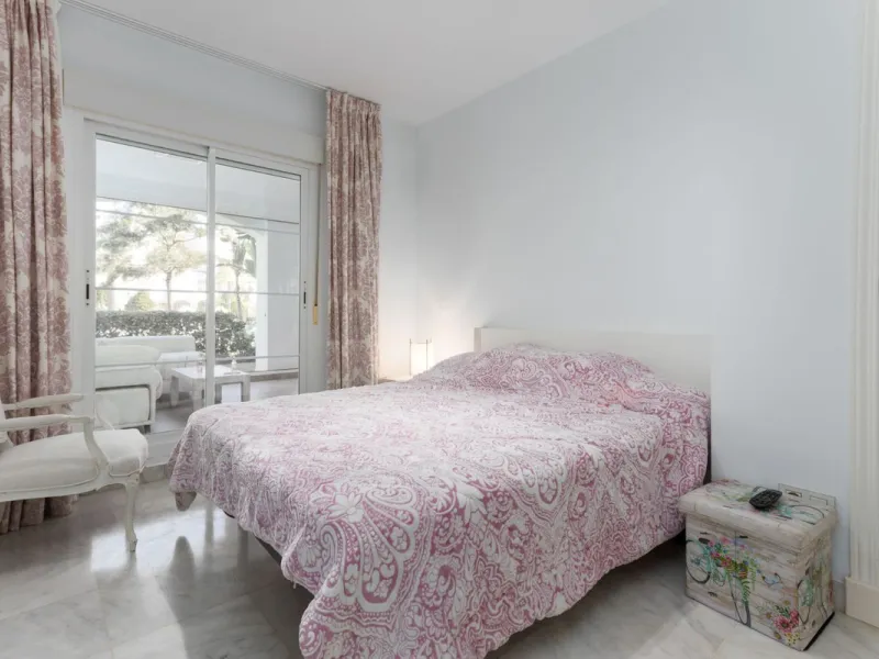 Discover luxury and comfort in this exclusive ground floor apartment in the prestigious urbanization of Las Adelfas!.