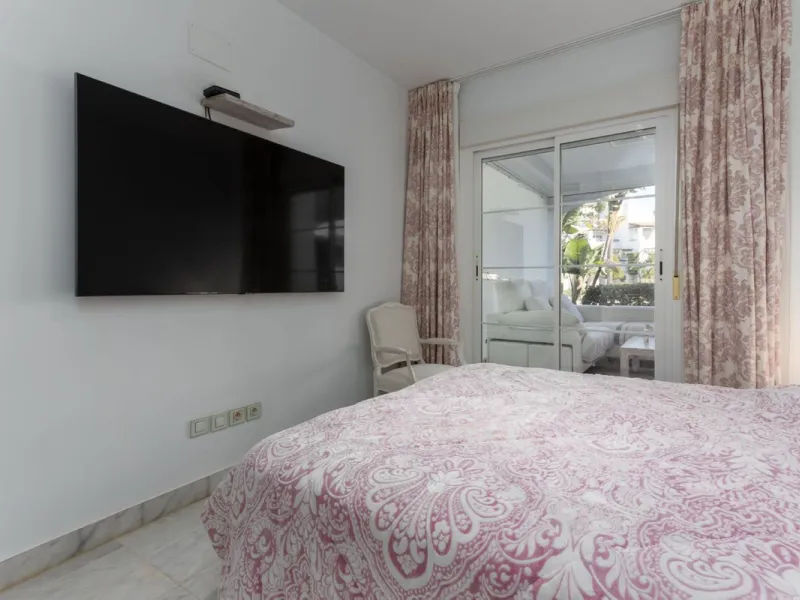 Discover luxury and comfort in this exclusive ground floor apartment in the prestigious urbanization of Las Adelfas!.
