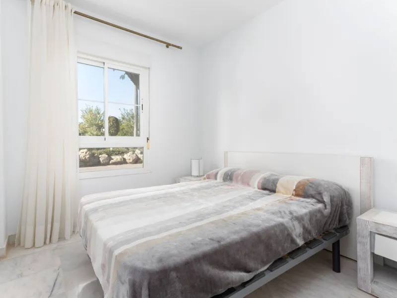 Discover luxury and comfort in this exclusive ground floor apartment in the prestigious urbanization of Las Adelfas!.