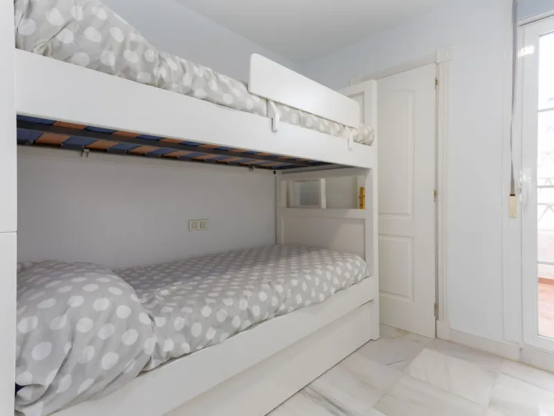 Discover luxury and comfort in this exclusive ground floor apartment in the prestigious urbanization of Las Adelfas!.