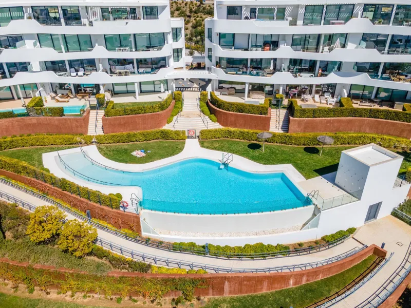 Luxury west facing penthouse, located in the exclusive urbanization of Higuerón West. Consists of entrance, hall way, spacious living-dining room with floor to ceiling glass sliding doors leading out to a large wrap around terrace of 158m2, with views of 