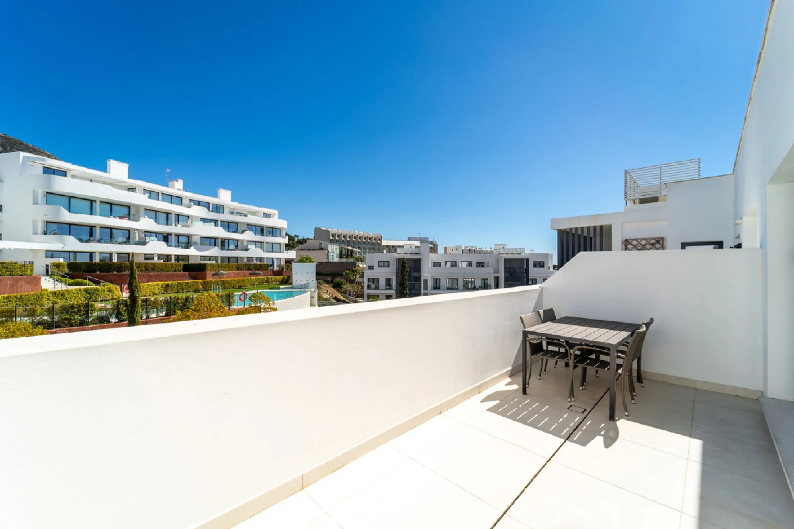 Luxury west facing penthouse, located in the exclusive urbanization of Higuerón West. Consists of entrance, hall way, spacious living-dining room with floor to ceiling glass sliding doors leading out to a large wrap around terrace of 158m2, with views of 
